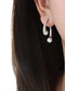 Elegant split design with high gloss pearl inlay simple titanium steel gold-plated earrings