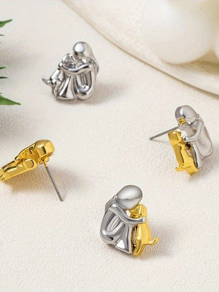 A little girl and a dog embrace earrings